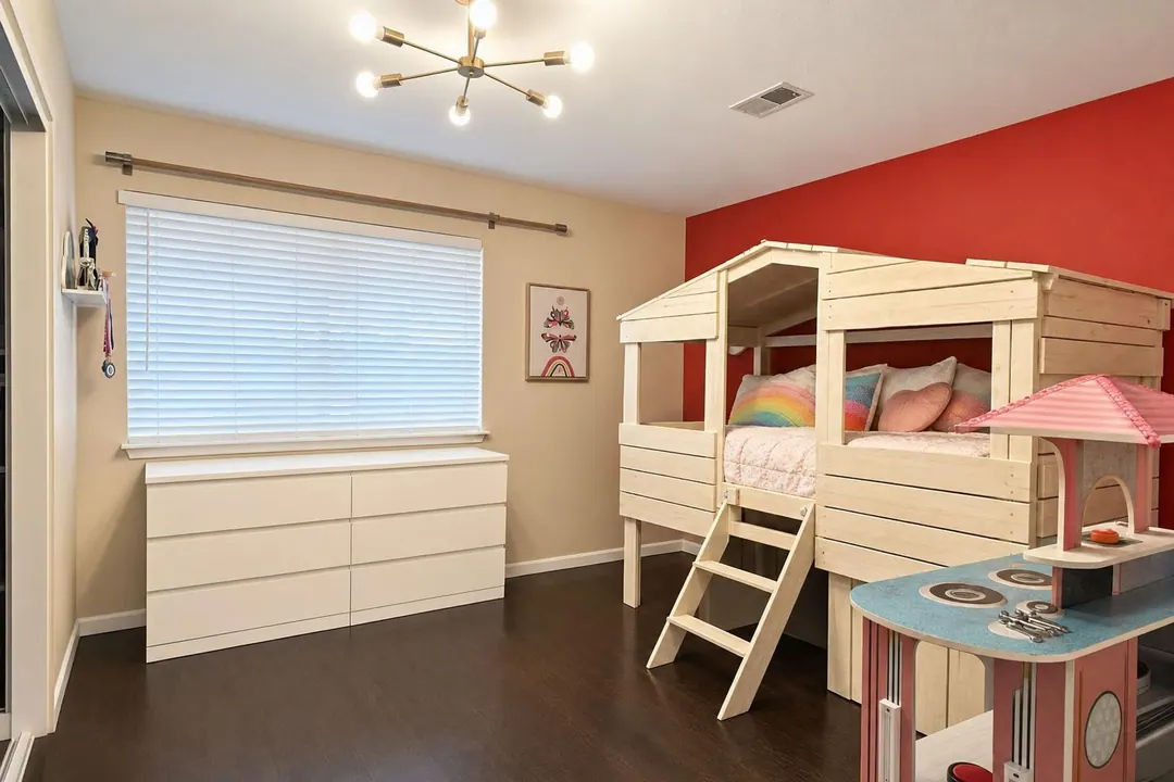 The same kid's room decluttered by Luster, floor cleared